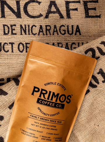 Open image in slideshow, Primos Coffee Company is single estate specialty coffee that has been family grown since 1929. It comes in a 12 ounce resealable bag in either medium roast or dark roast. Grind choices include coarse ground for French press, medium ground for drip brewing or fine ground for espresso. All bags ship free.